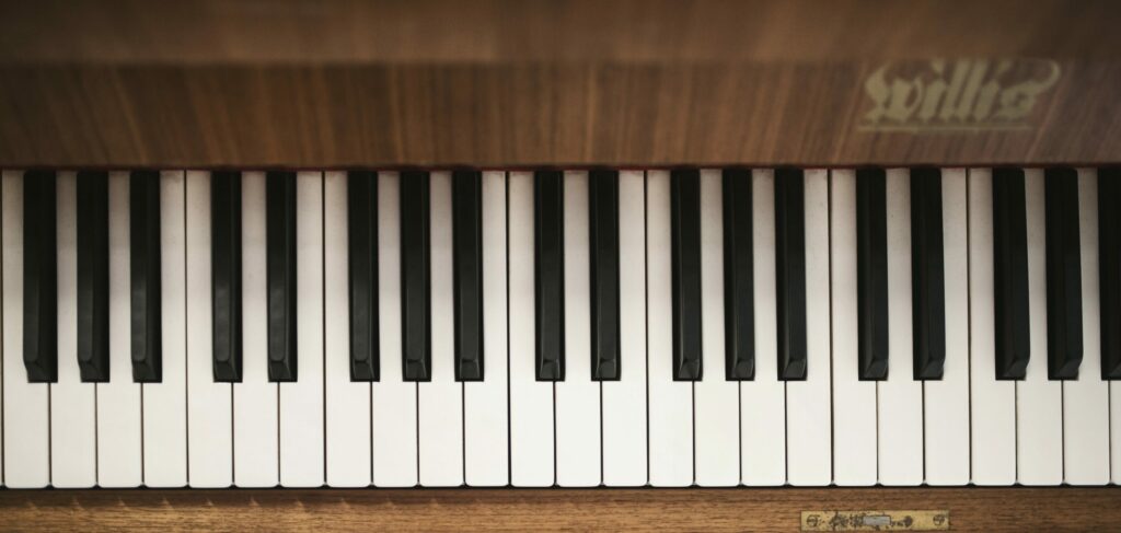 Why Do Piano Keys Stick At Times? - Score Music Tech